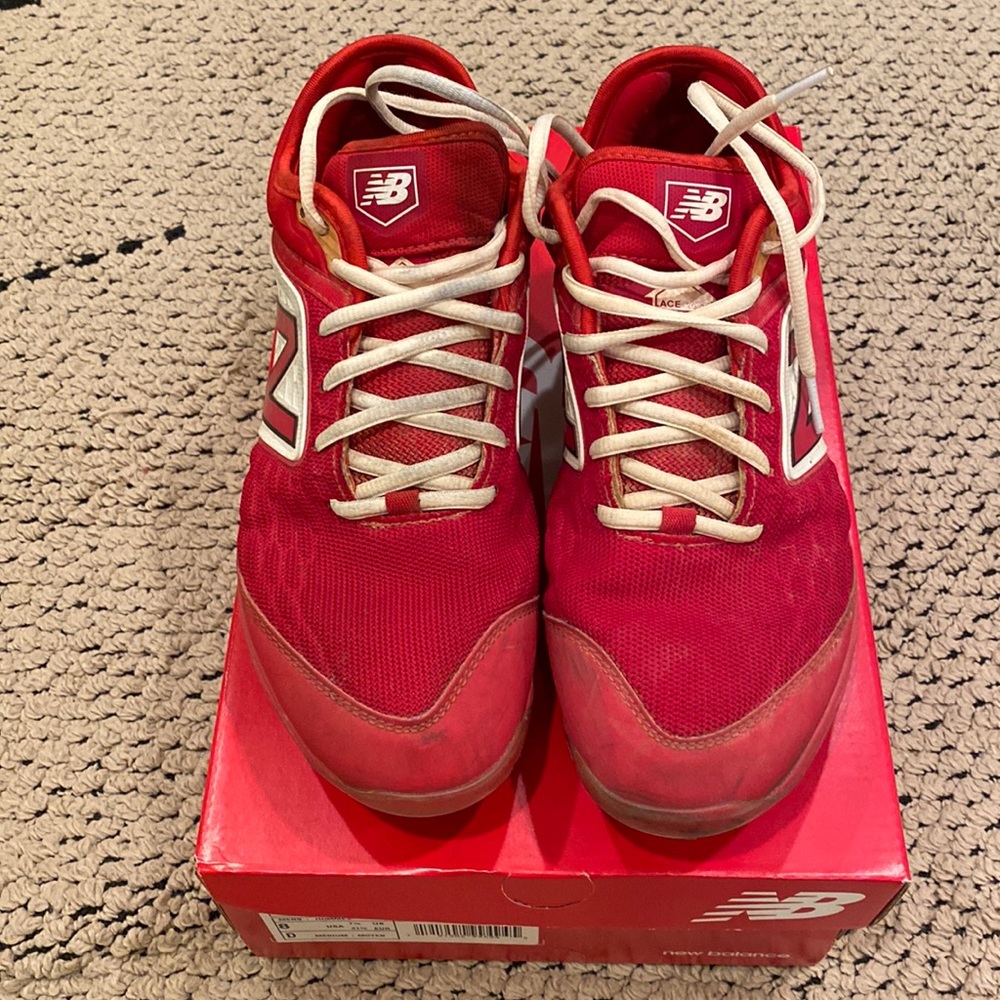 Mens New Balance molded cleats size 8